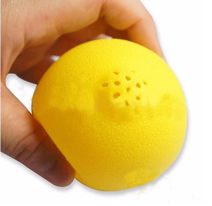 Hand pressing lemon juicer