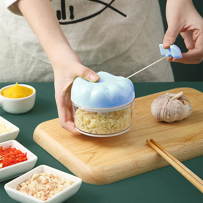 Hand-held garlic masher