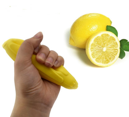 Hand pressing lemon juicer