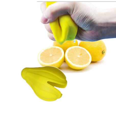 Hand pressing lemon juicer